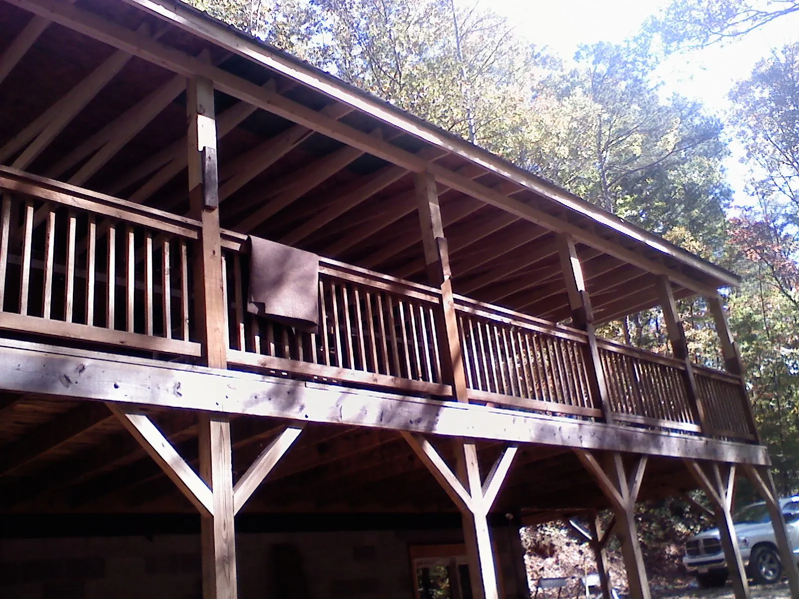 Timber framing under a new elevated porch and deck — Roof Leak Repair in Sealy by Roofing Brothers